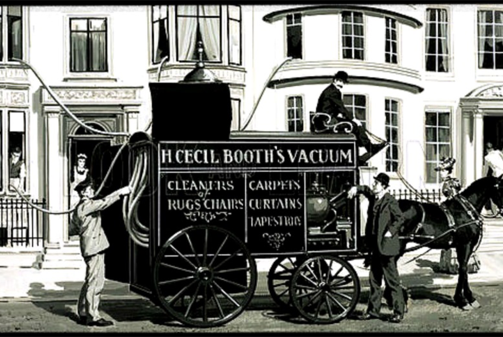 Why was the first vacuum cleaner in history horse-drawn and kept outside the house?